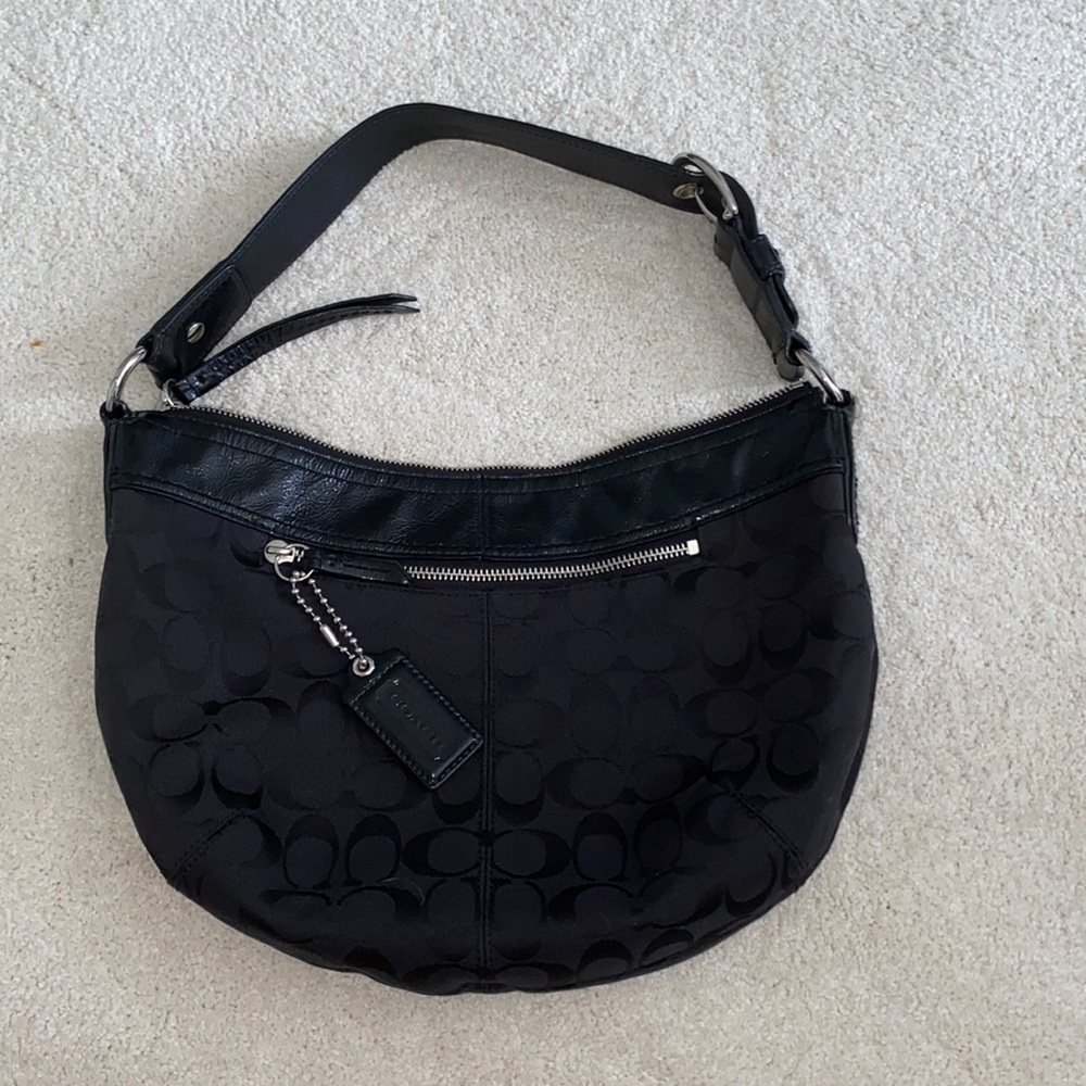 All black Coach purse (price is negotiable)